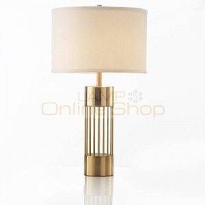 Modern simple personality creative table lamp foyer bedroom study American model room gold Iron luxury art LED reading lamp